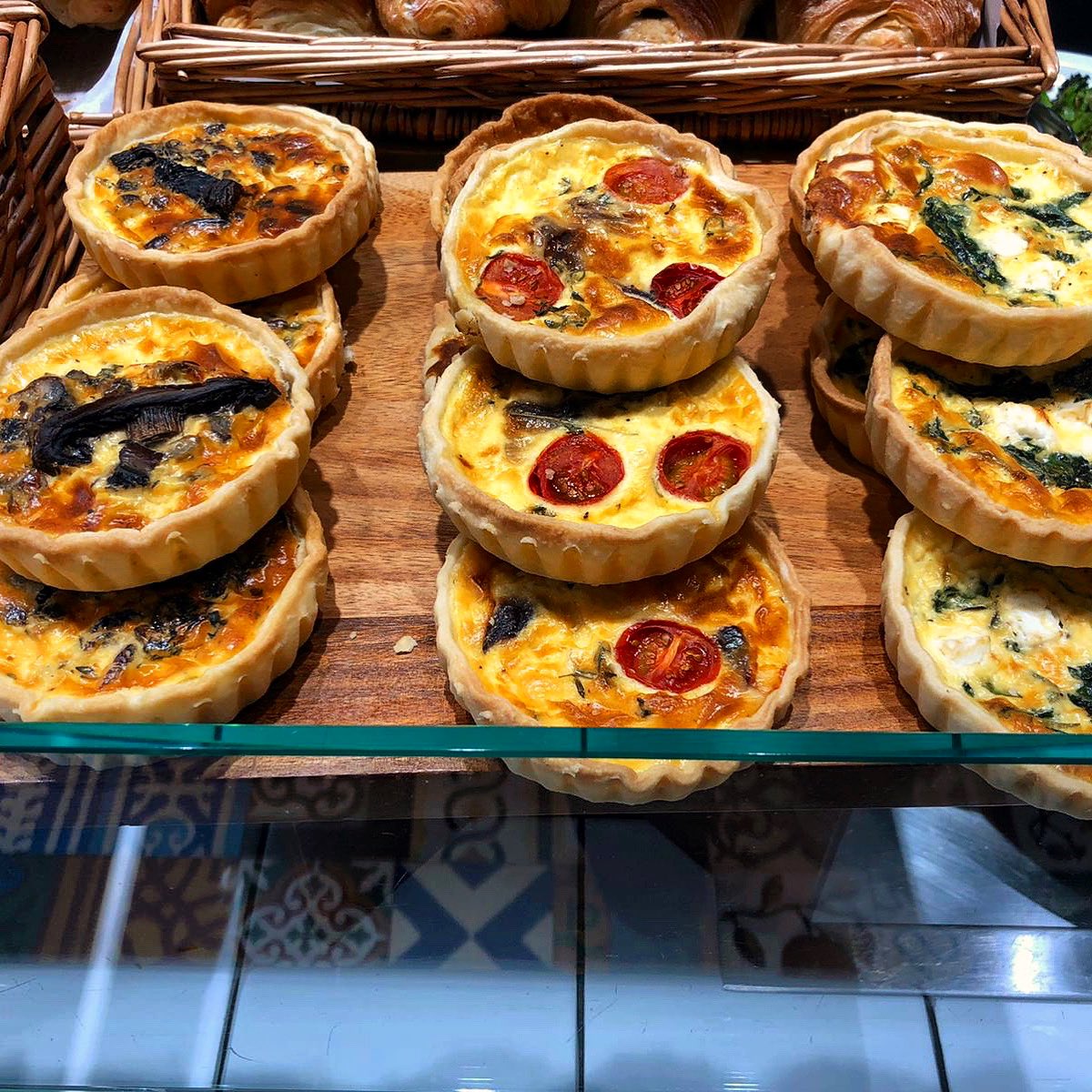 Our glorious quiches are made by hand and baked fresh every morning.  Perfect way to warm up on a grey day like today. All are flavours are veggie friendly, tomato and caramelised onion, spinach and feta or mushroom and cheese 😋 #Islington #Camden #Haringey #Foodie
