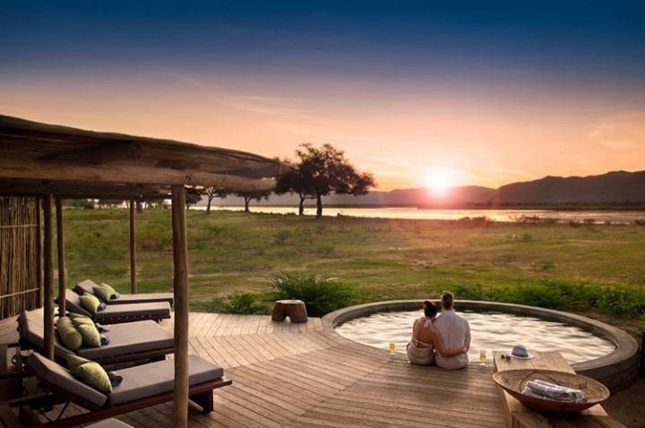 mytarooka's tweet photo. Did someone say getaway??? Now Nyamutusi camp will give you intimacy and that amazing safari feel. A sunset experience with a glass of the best...you got to want that
#manapoolsnationalpark
#Zimbabwe 
#africaunleashed https://t.co/Cpt2BiglJ4