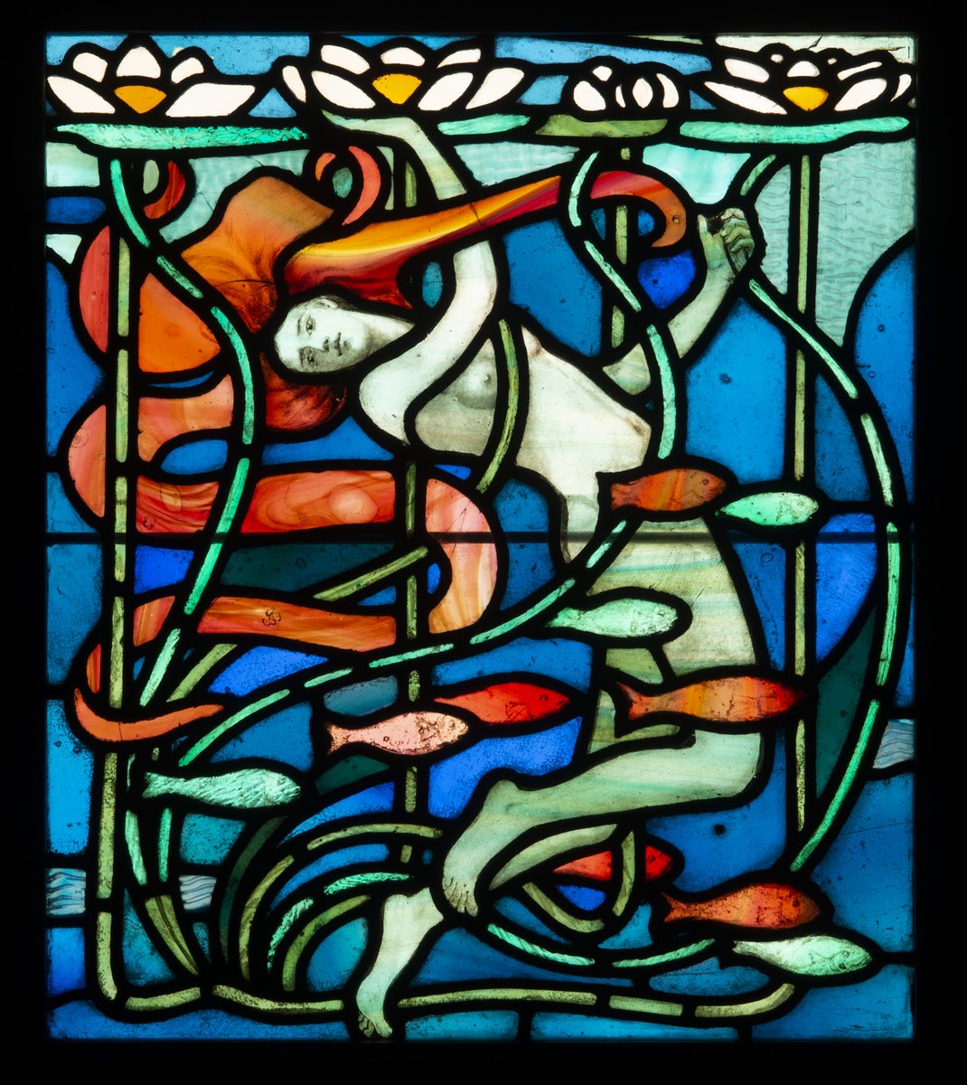 KelvingroveArt's tweet photo. Today is #WorldArtNouveau Day! This year's theme celebrates the rich colours and beauty of Art Nouveau stained glass. Here is one of the most striking of the Glasgow Style leaded-glass panels in our collection. 'Water Sprite' (about 1895-96) was designed by William Scott Morton. https://t.co/hxzPmyuZCh