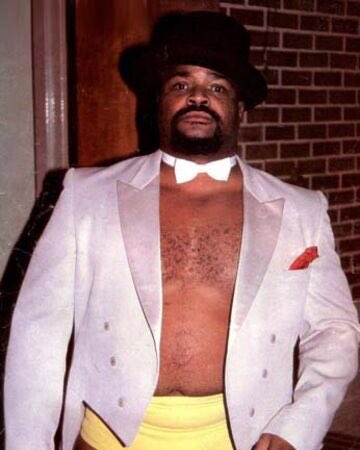 Pistol Pez Whatley wrestled in the 80s and 90s for the NWA and WCW. He changed his name to Shaska Whatley and feuded with Jimmy Valiant over an unintentional racial insult. Whatley wanted to be called Shaka Whatley but thought it was too similar to Chaka Khan.