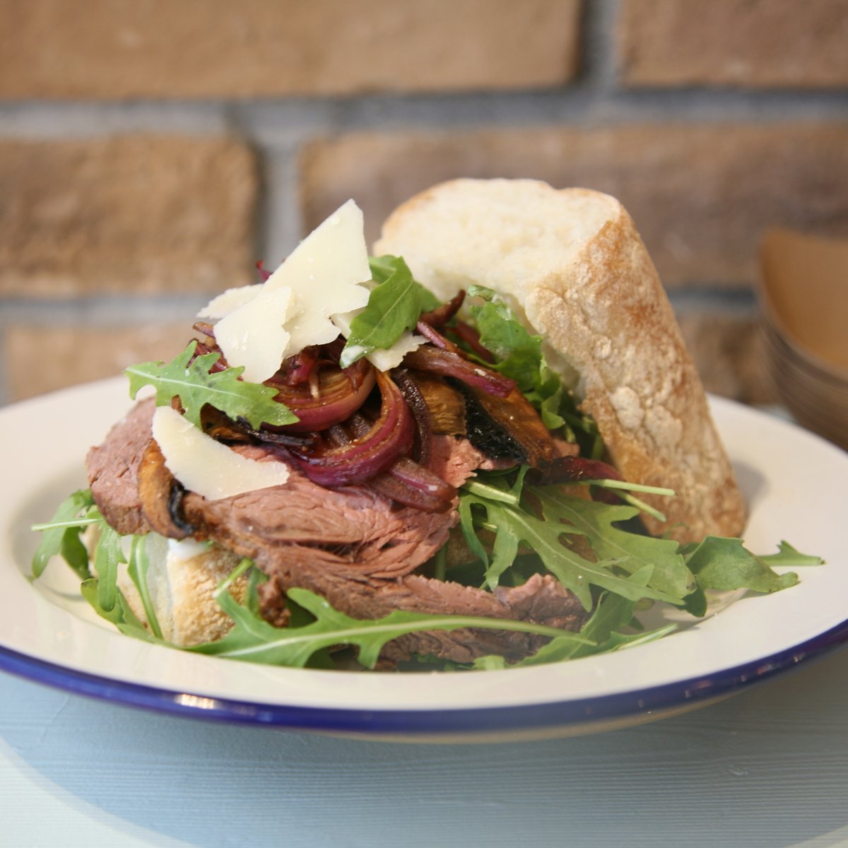 Roast sirloin of beef with horseradish mayo, caramelised red onion, portobello mushroom, rocket &amp; parmesan shavings on ciabatta bread. We’ve been thinking about doing this one for years, and today’s the day! Serving now.