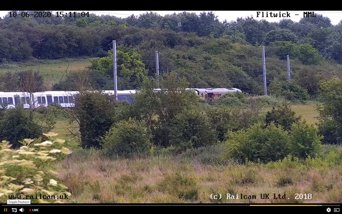TrainSutton's tweet image. here we see the new @SW_Help #class701 701002 being dragged to eastleigh with the help of 2 @GBRailfreight #class66 on Flitwick cam @railcamlive #SpottingFromHome