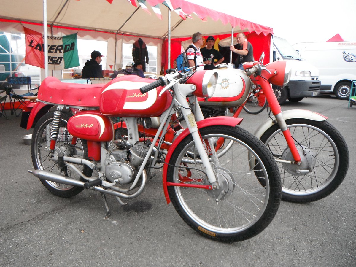 vmccuk's tweet image. Photos from a member from the Trofeo Rosso track weekend. We see the member’s bike at a roadside café on their way there and a couple of tiddlers in a paddock. The far one is an MV, the near one a VAP. #trofeorosso #trackevent #motoguzzi #italianbikes #MV #VAP #vintagemotorcycle