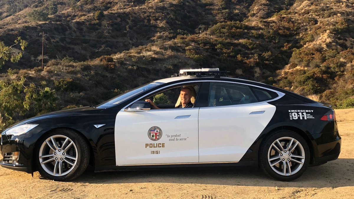 KateRoseMe's tweet image. My friend just lost her job as a counselor at an inner city Los Angeles public school. The kids won't have a counseling program now. Also, here is an LAPD Tesla.