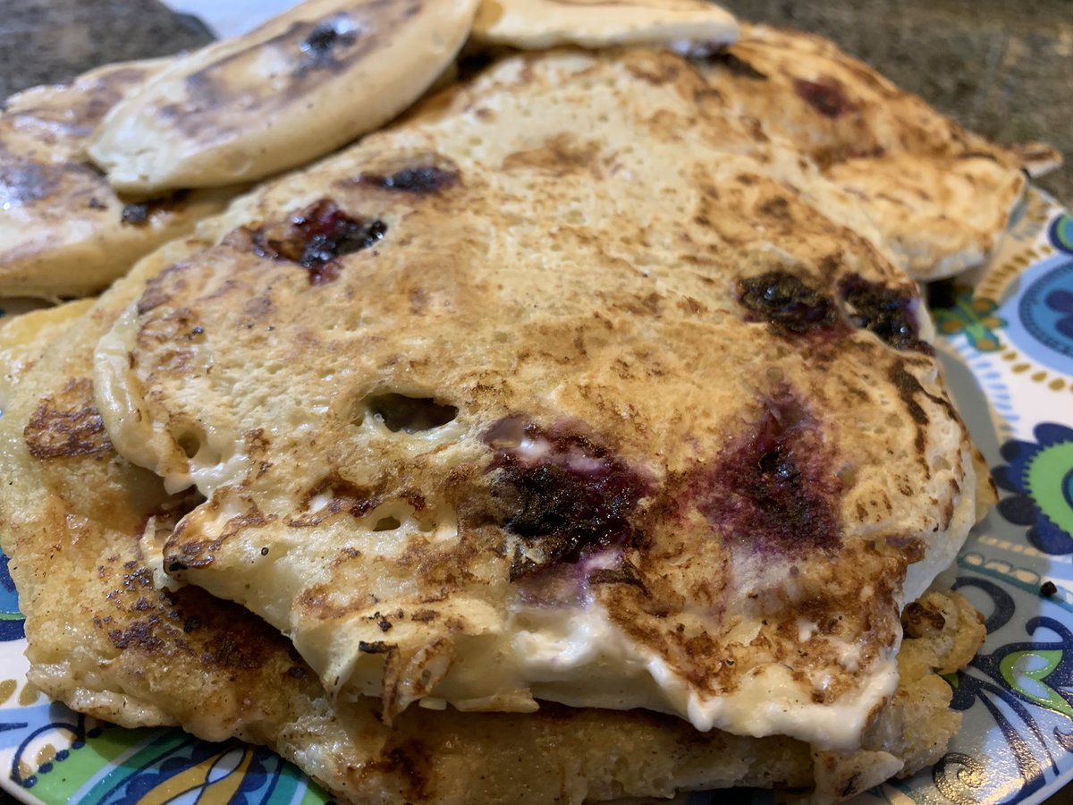 Blueberry creamcheese pancakes with a mixed berry compote for breakfast today 