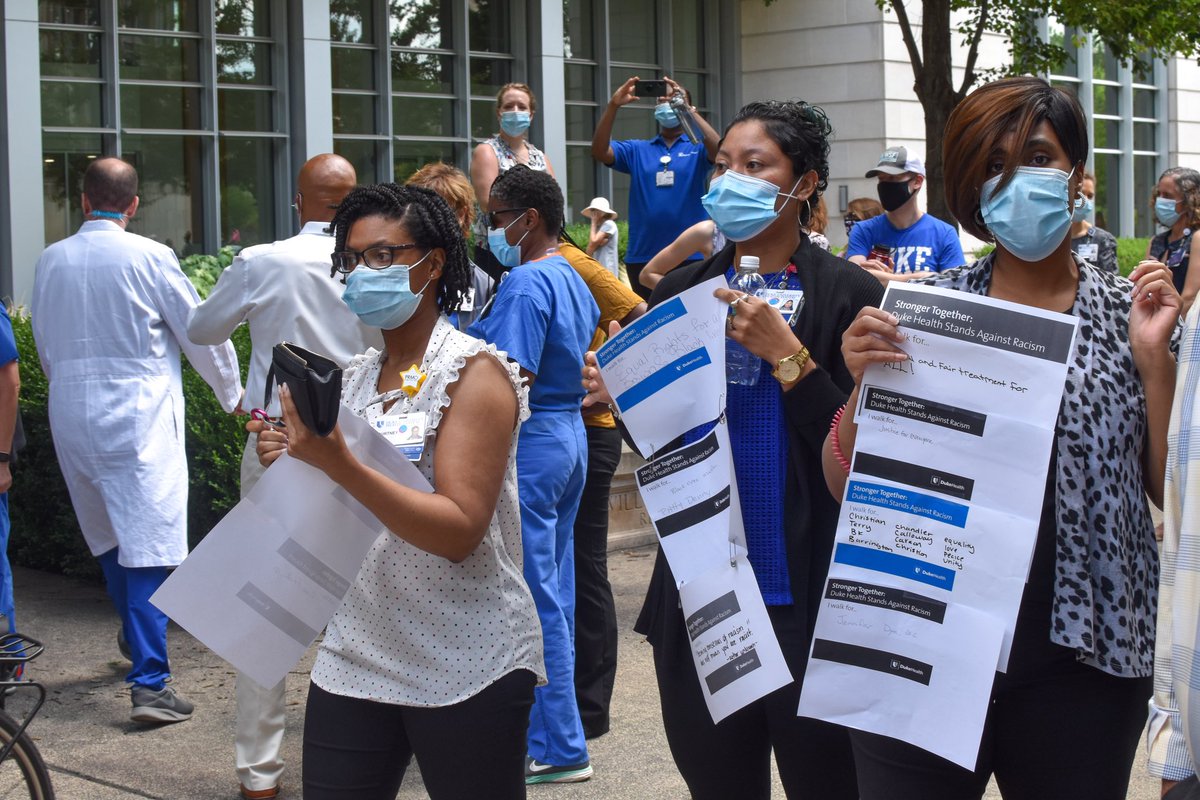 DukeHospital's tweet photo. Today, we gathered in solidarity to stand against racism. We walked together to reach across divisions and take a step to create an equitable society. During the @DukeHealth “Moment to Movement” walk, team members advocated for change to address racism and social disparities. https://t.co/GdR2JmUwFm