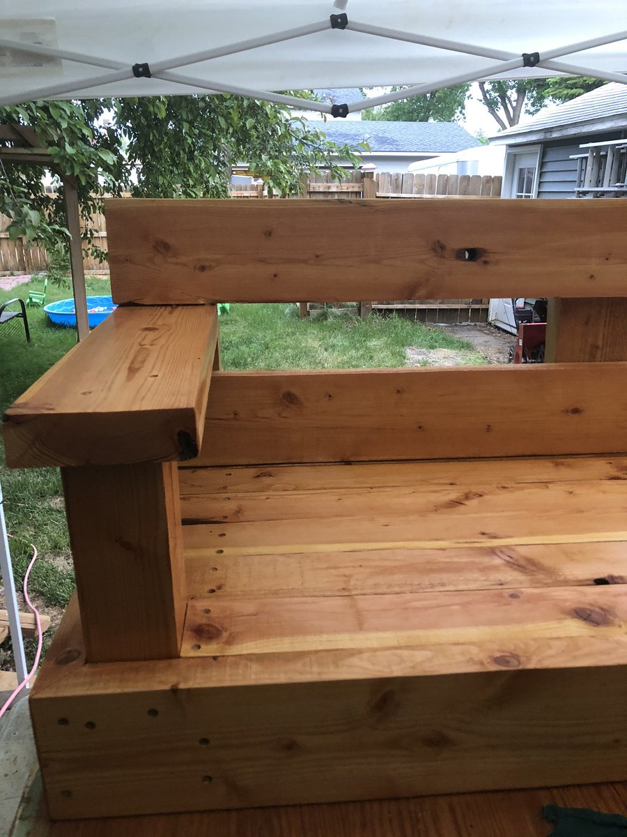 whittyp44's tweet photo. The swing getting stained and sealed. This and the support were made from old cedar telegraph poles. My oldest son has been such a great help. He is an awesome young man. https://t.co/aFJbdLHhw2