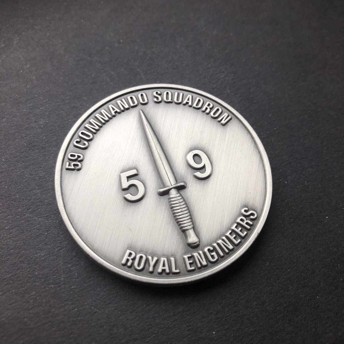challengecoinuk's tweet photo. Coins don’t need enamel on them to look great! 

Here’s a great example for 59 Cdo Sqn RE with antique silver metal finish and a 3D Dagger. 

#britisharmy #royalengineers #sapper #59commando #commando #dagger #commandodagger #royalmarines  #commandoengineers https://t.co/Er4aeK5GNH