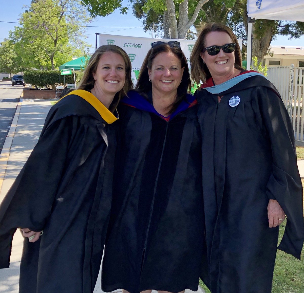 ThousandOaksHS's tweet image. Dedicated Assistant Principals share a smile after a beautiful Diploma Ceremony. #BleedGreen Go Lancers!