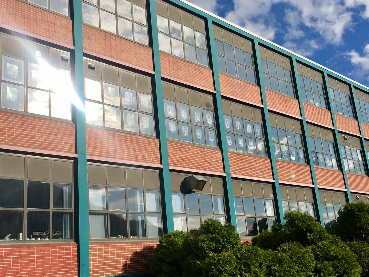 Our wonderful Grad 2020 class peers out from the windows of <a href="/LVRsecondary/">LV Rogers Secondary</a> — all 172 of them #classof2020 <a href="/SD8KootenayLk/">SD8 Kootenay Lake</a>