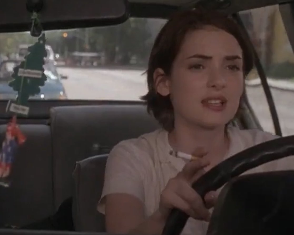 coolgirling's tweet photo. winona ryder in cars with a cigarette https://t.co/BZP2DMh4x8