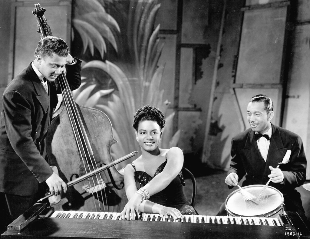 Classically-trained pianist + music teacher, her mom, Alma Long Scott, "the single biggest influence in my life,”   #HazelScott once joined her mom& #39;s All-Woman Orch on piano + trumpet.Hazel staged a 3day strike against apron costumes Black actresses were to wear for THE HEAT& #39;S ON