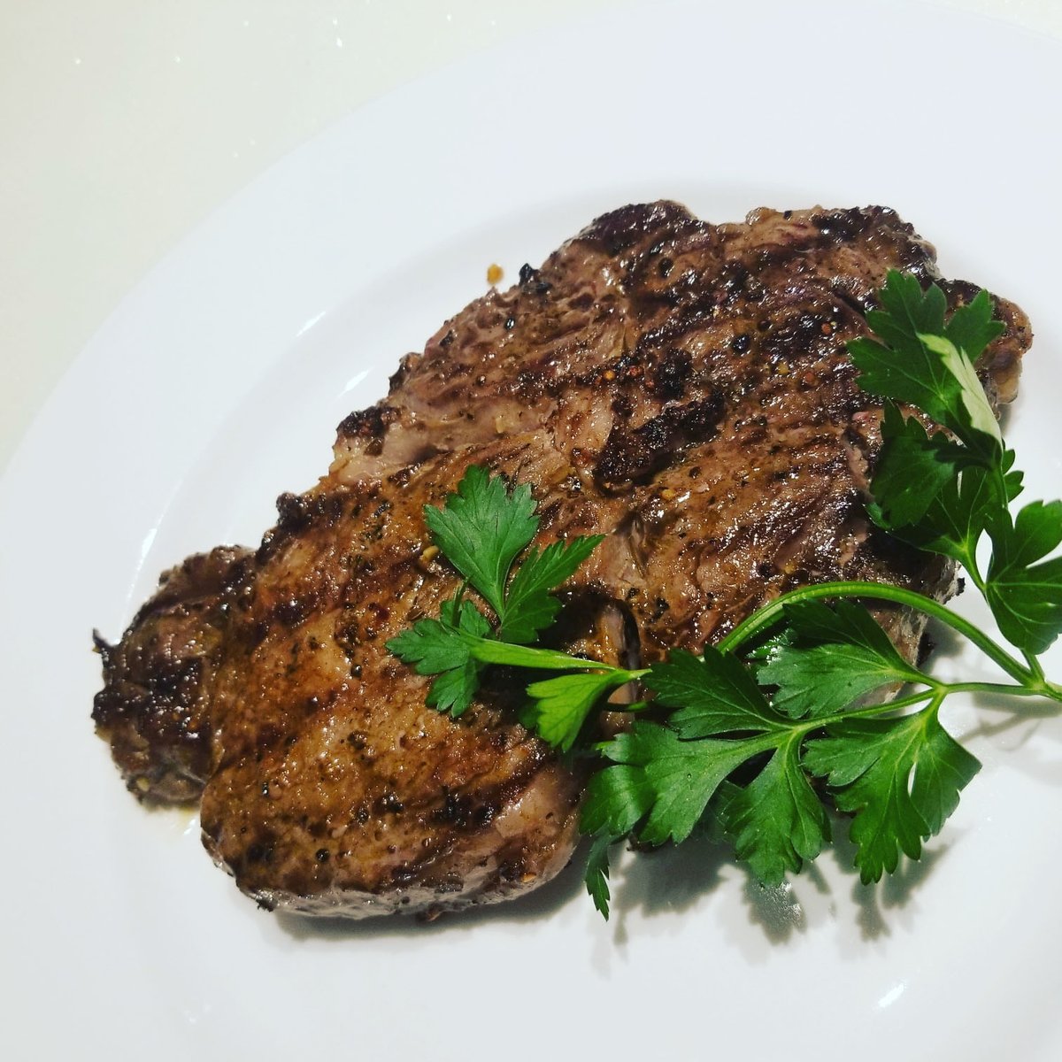 E3Chophouse's tweet photo. Our grass-fed, grain-finished steaks are beautifully marbled, offering a carefully selected mix of fat and lean for buttery-soft texture and robust beef flavor – a winning combination! #e3chophousesteamboat #humblyserving #e3meatco #grassfed #grainfinished #steak https://t.co/ZMyDK1gqmA