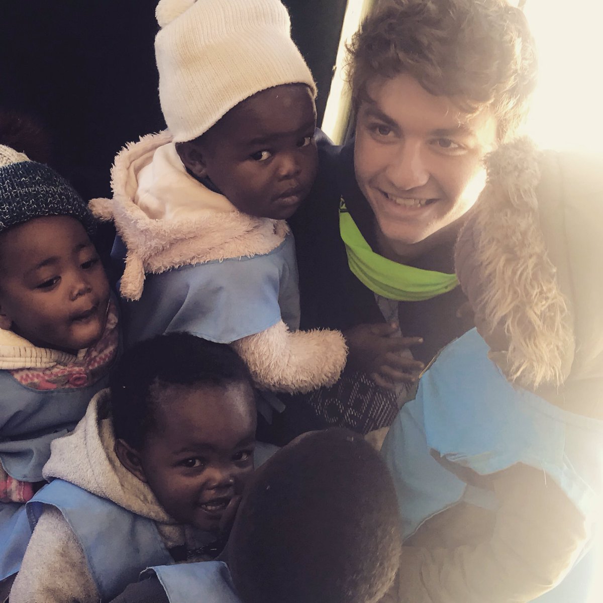 TWKTV's tweet photo. This #ASmileADay is Seamus with school kids in #Soweto. We visit a school there every year on our @Travel_WithKids tour. Share your smile pic and tag @Travel_WithKids and use #ASmileADay and join the movement. https://t.co/4Uy4cgVn2u