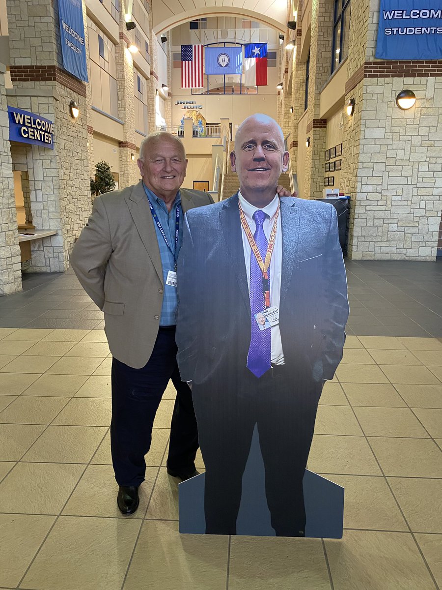 IS THAT????? Yes it is! Everywhere I go I run into this guy and everyone I speak with say he has been on their campus or sneaking around in some dark hallway. He even threatened a grievance yesterday for being held against his will. I’m the one on the left!