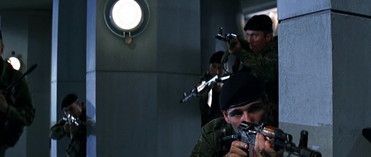 Though fears are dampened by realising these supposed hardened killers are all pointing guns in different directions so clearly the mercenary department is underfunded as well which is certainly "par for the pissin& #39; course with management around here..."