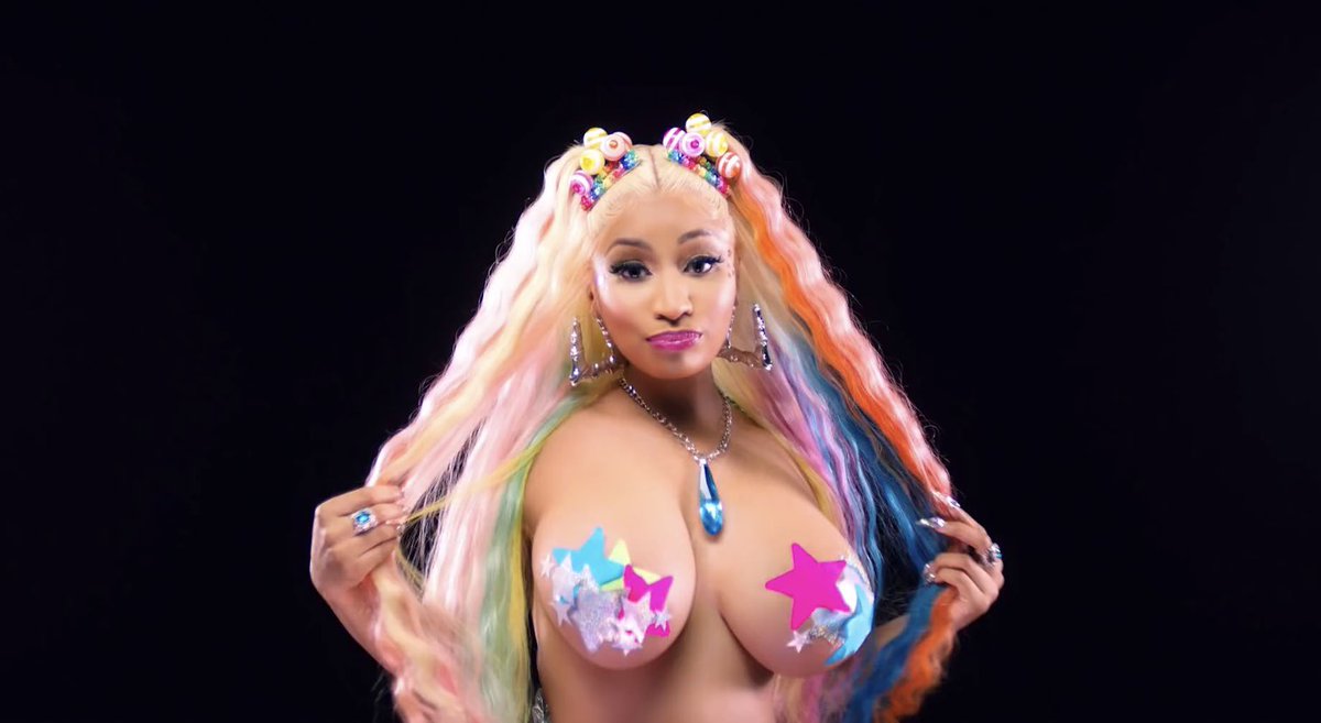 .@6ix9ine and @NickiMinaj have released the colorful music video for #TROLL...