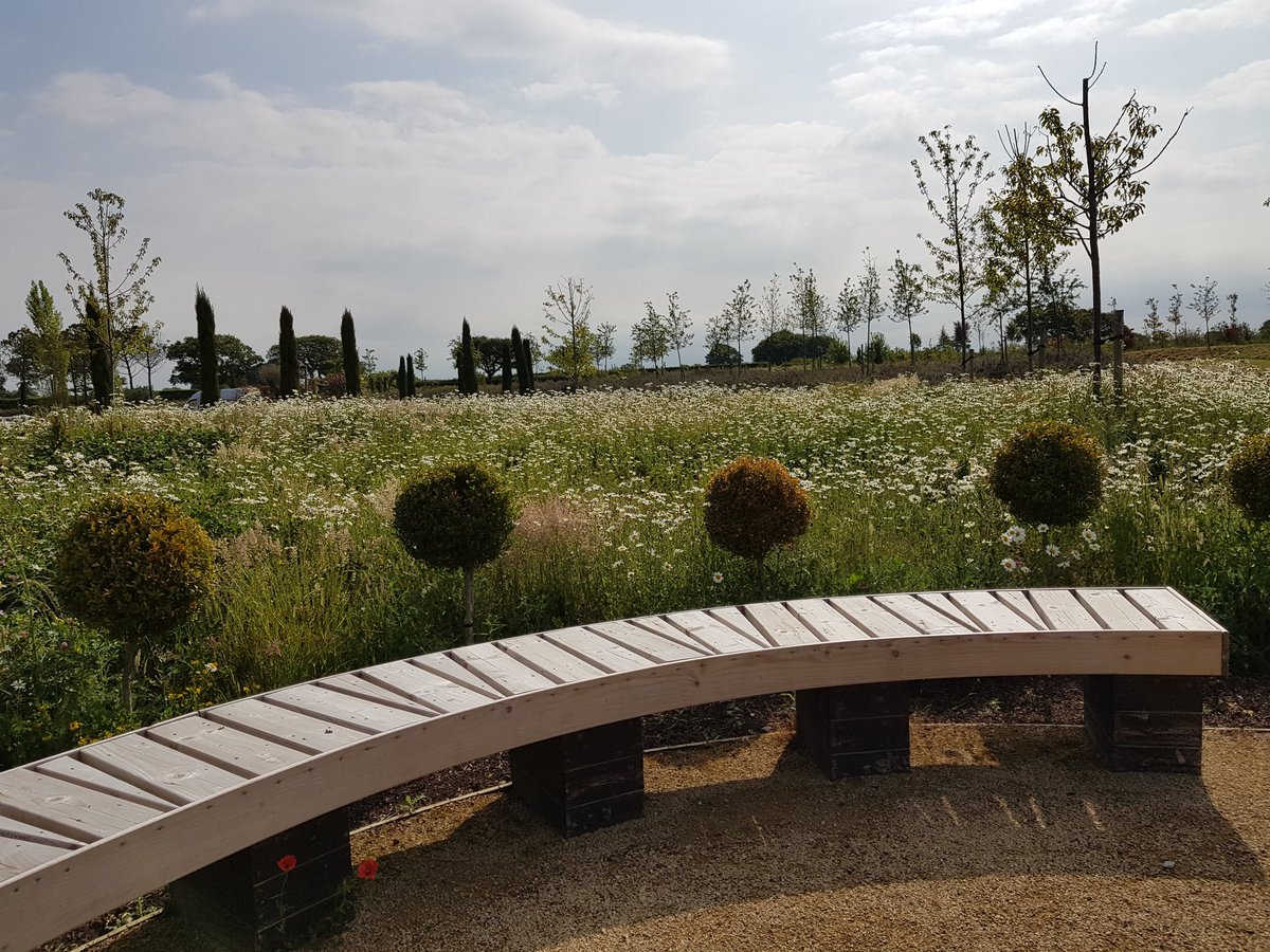 BirchesRem's tweet photo. We love our garden @BirchesRem - with seating areas such as this placed around the garden and amongst the flowers and meadows which we hope will provide places to reflect and remember for our visitors. https://t.co/cNasMTEqwA