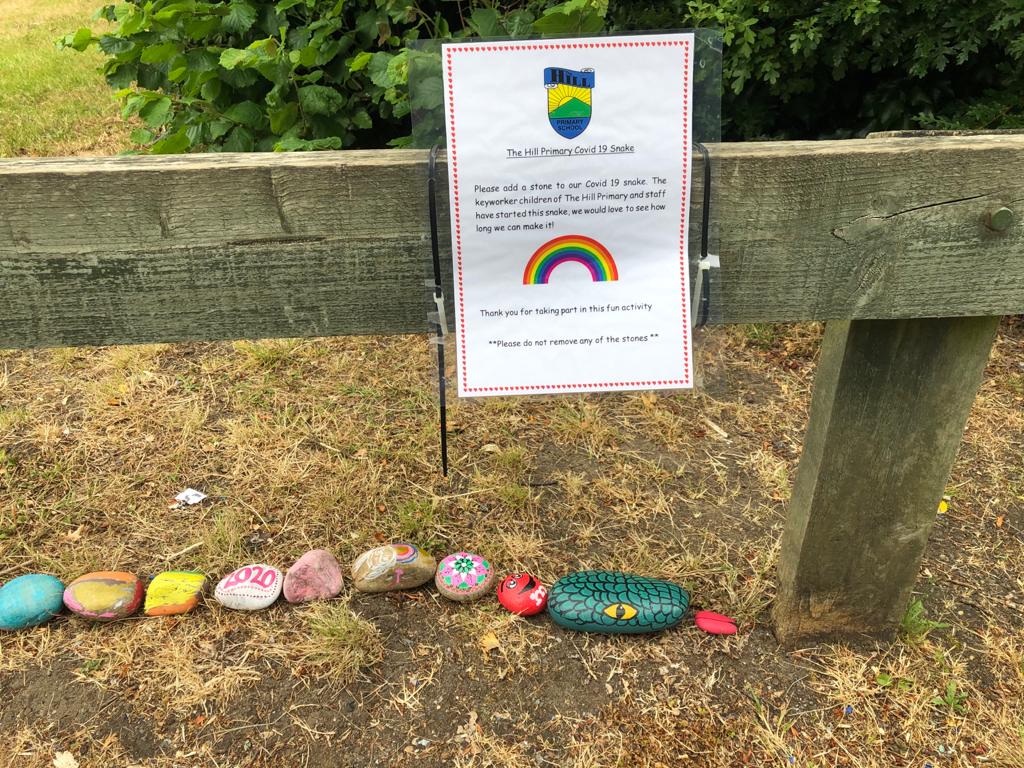 Have a look at our stone snake outside school. Do add to the length but please don't take any away.