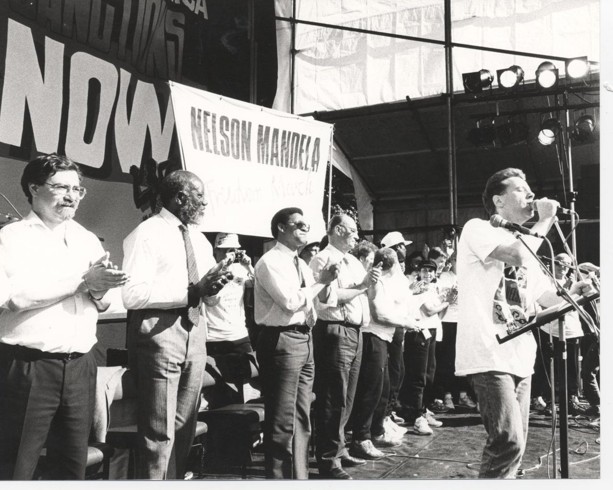 mandelasmf's tweet photo. On 12th June 1988  30,000 people marched to Glasgow Green to call for Mandela's release and sanctions against apartheid South Africa.  Jim Kerr sang "Mandela Day".  Oliver Tambo spoke, with Trevor Huddleston, Allan Boesak,  Andimba Toivo ja Toivo and others.   @simplemindscom https://t.co/nFrQmgTHoI