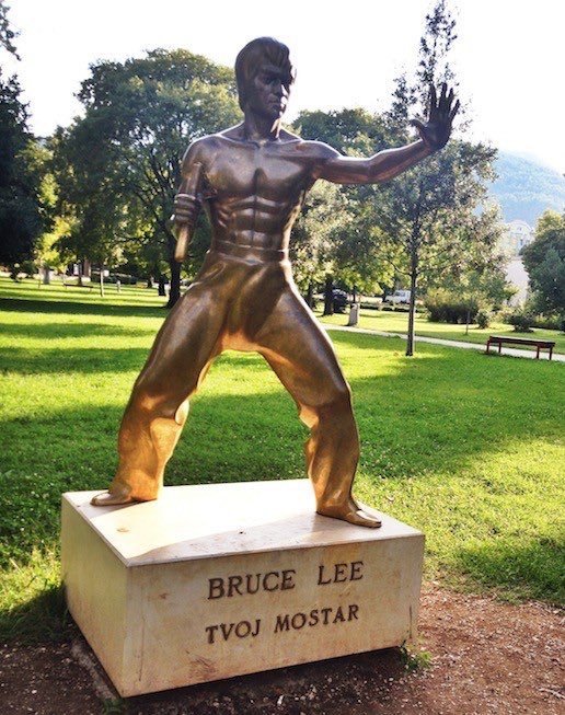 Bruce Lee in Mostar, Bosnia, supposedly an attempt at finding a culturally neutral figure for the Bosnian and Croat communities post-conflict. Both sides were angry about it, vandalised, moved to a park.
