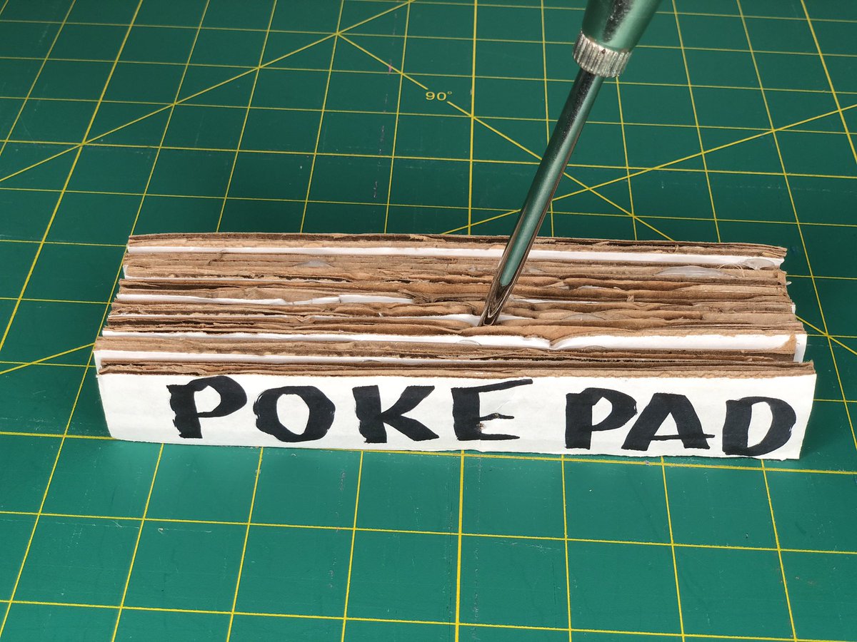 cateheroman's tweet photo. Love my “poke pad”! Just hot glue cardboard strips together! Use with tools like an an awl, nail, skewer or golf tee. #tinkering #makingandtinkering @KnockKnockCM @TinkeringStudio https://t.co/AmDV15qvL7