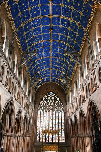 There's a hundred different types of ceiling and I'm not gonna get into that here, but basically cathedrals generally have "vaulted" ceilings. The main types are "Rib Vaults" (have 'ribs' running diagonally) "Fan Vaults" (v.fancy) and "Barrel Vaults" (semi-circular)