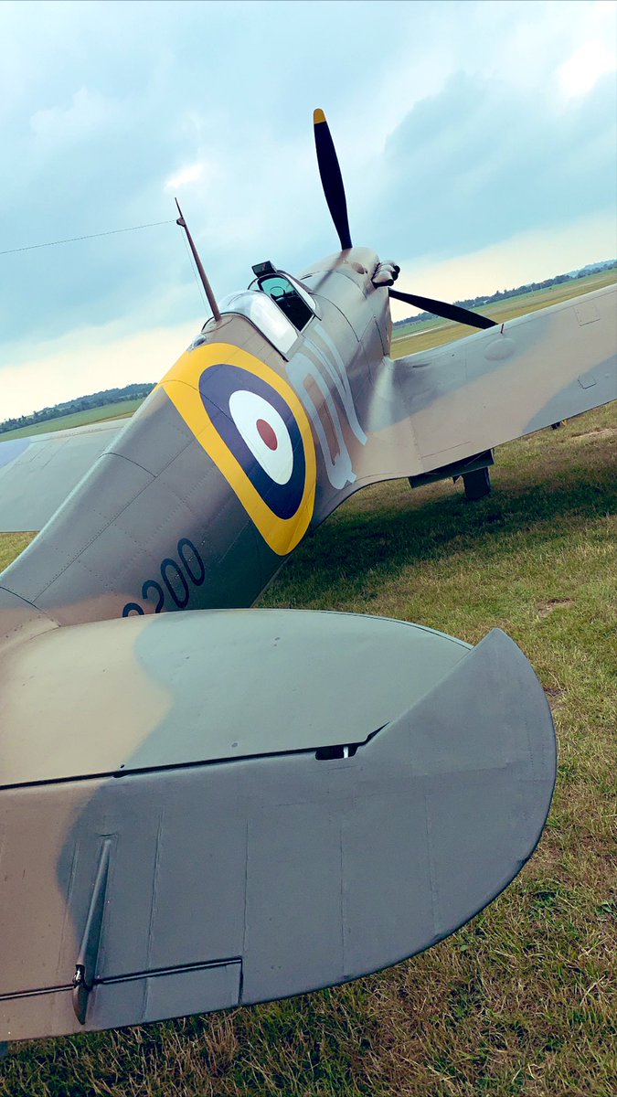 Bremont's tweet photo. The roar of a #Spitfire Mk1 engine is a thing to behold. We’re spending today at The Aircraft Restoration Company with Bremont ambassador and vintage aircraft pilot, John Romain https://t.co/AXyk2n5eN3
