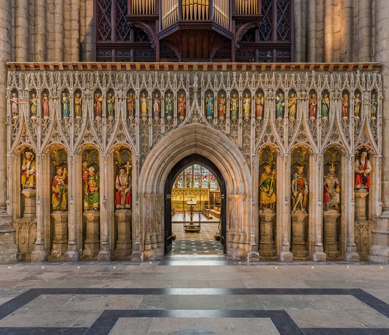 Rood Screen: A screen, generally made of wood or stone, that sits between the crossing and the Quire.
