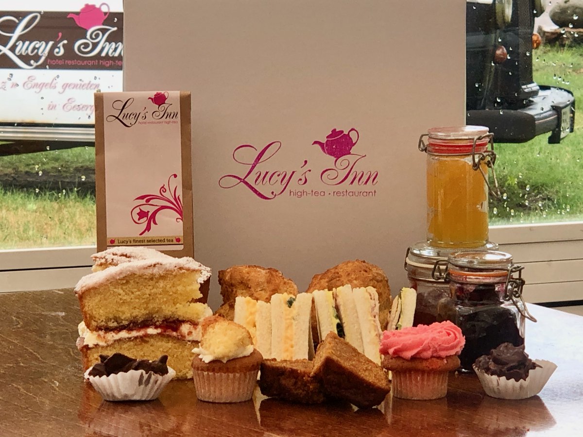 Lucy's Vaderdag High Tea voor thuis.
Een doos met huisgemaakte lekkernijen. Met sandwiches, Victoria spongecake 
Scone met jam en clotted cream, carrotcake,
Chocolade cornflake cakeje, mini cupcake,
en thee €25.00 bel 0599287250 of mail info@lucysinn.nl.