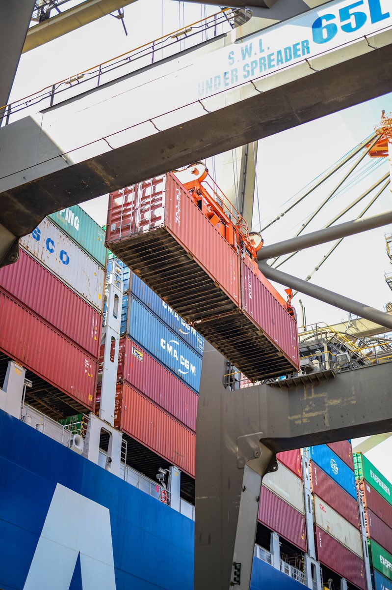 PortAuthorityJa's tweet photo. What’s happening here?

A crane operator unloads two 20ft containers simultaneously, from an awaiting trailer truck, onto the CMA CGM vessel for transport internationally. 

This is highlights just one of the many transshipment operations that takes place at the #PortofKingston. https://t.co/iMwurgHPSS