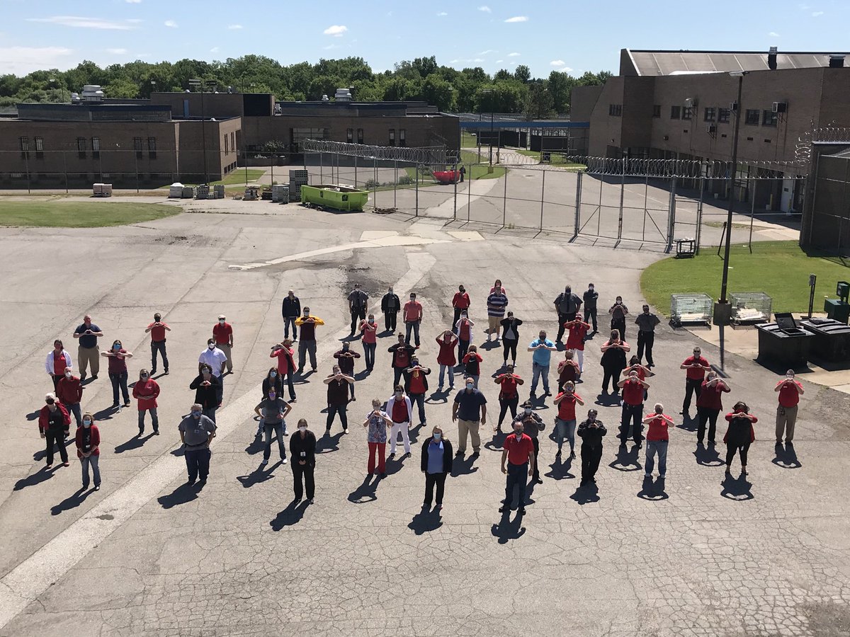 SchooleysScott's tweet photo. Today TCF honored the passing of Kay Williams by wearing the color red, Kay’s favorite color.  TCF poses for a group photo forming a heart shape with their hands during a moment of silence .  We miss you Kay , Rest In Peace ❤️❤️ https://t.co/VzsQyJX3CV