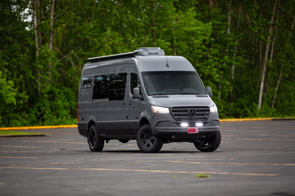 Outsidevan's tweet photo. Rxcape is the latest custom Outside Van to hit the road. This Sprinter 170 has passenger seating for 12 (complete with a drop down TV up front!) that’s removable so that the upper & lower sleeping platforms can be used for overnight trips. https://t.co/ZuNKAcmfj5 #outsidevan https://t.co/flY9345LK5