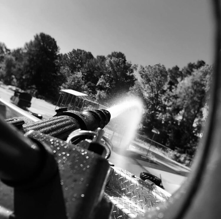 Engine 1 flows water from their deck gun at Murray Street Training Facility on a beautiful afternoon.
