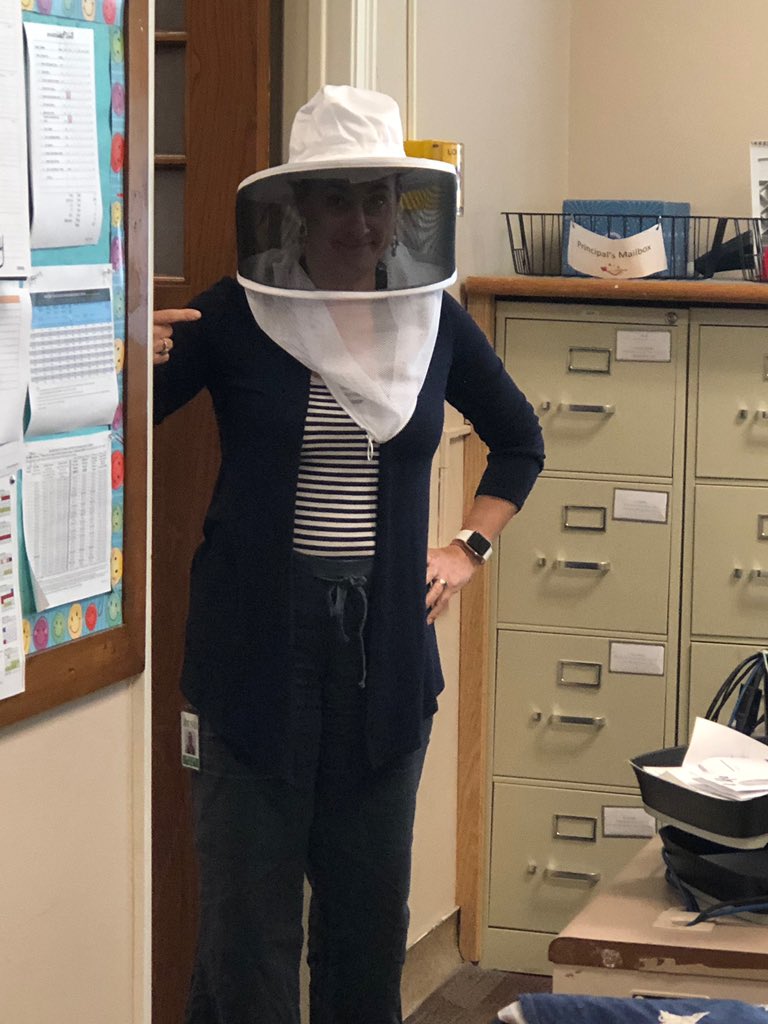 Trying on a beekeeper hat. 🐝 Can’t wait time share this adventure with the kids in September!! @RCSDsch46