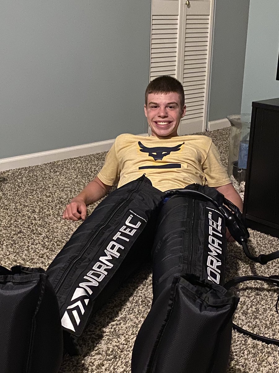 Dahler4's tweet photo. @esson_black relaxing with the @NTRecovery 🤩 #runnertherapy

Our XC coaches are awesome!! 
@CCHSGirlsTrack https://t.co/9KFFthOICQ