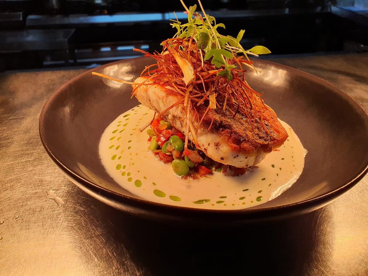 Panseared Bara with Broad Bean salsa, coconut emulsion,  crispy leek on top