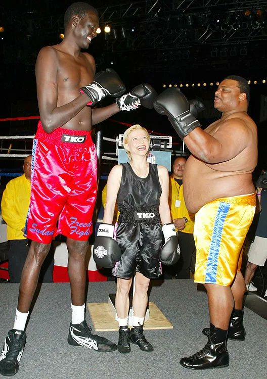 SI Photo Blog — Manute Bol (7-foot-7, 200 lbs) runs back on