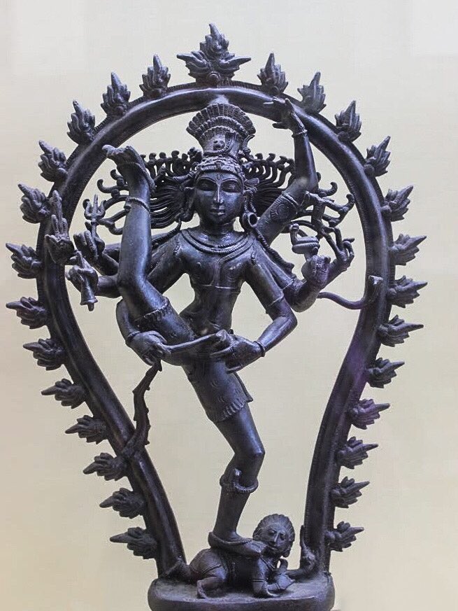 ऊ is for ऊर्ध्वतांडव मूर्ति or Urdhvatandava murti, one of the  #FormsOfShiva where he stands on one leg with the other leg raised vertically upwards in the urdhva-janu pose. (Photo: Bronze, 12th century CE, Thanjavur Museum) #AksharArt  #ArtByTheLetter