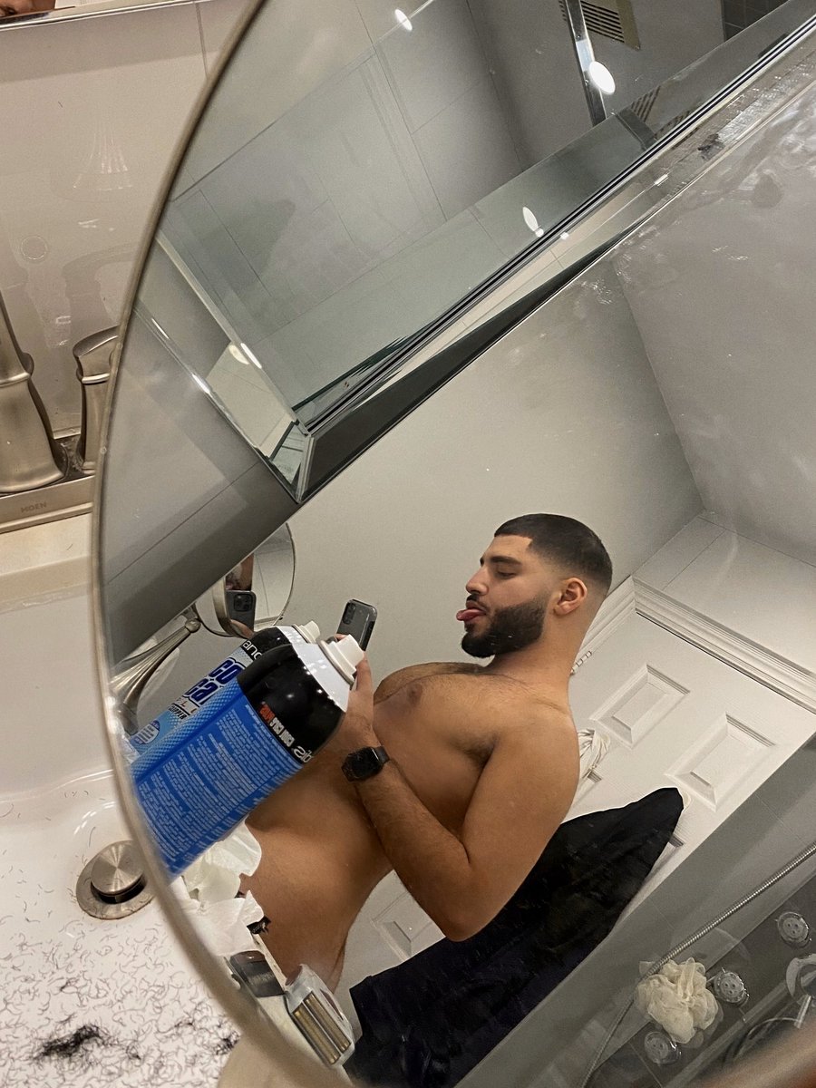 💇🏽‍♂️