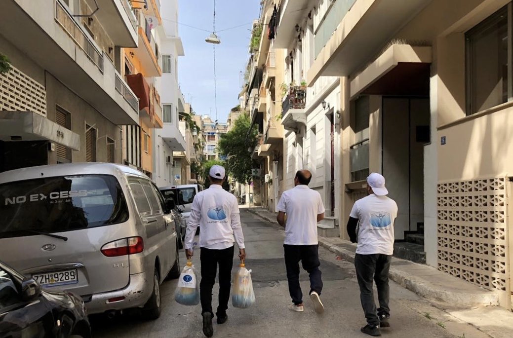 HFI1995's tweet photo. Distribution of food packs for #refugee families in #Athens struggling through the impact of #COVID19 in #Greece https://t.co/oEqYwyRrPf