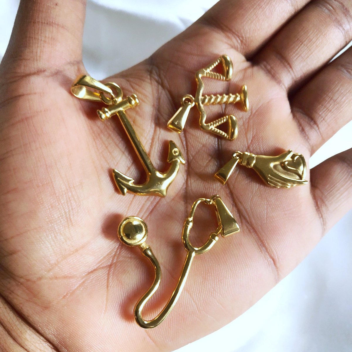 GOLD OR SILVER???Non-Tarnish pendants, won't fade or tarnish Available in-store!!!Price: 1000-1500 each Available for immediate delivery Send a Dm to purchase of these. PLS Rt