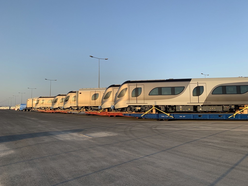 PeninsulaQatar's tweet photo. .@qrc_official gets delivery of new metro trainsets at Hamad Port
#Qatar 
https://t.co/Hpws46skJQ https://t.co/kuy36nawGn