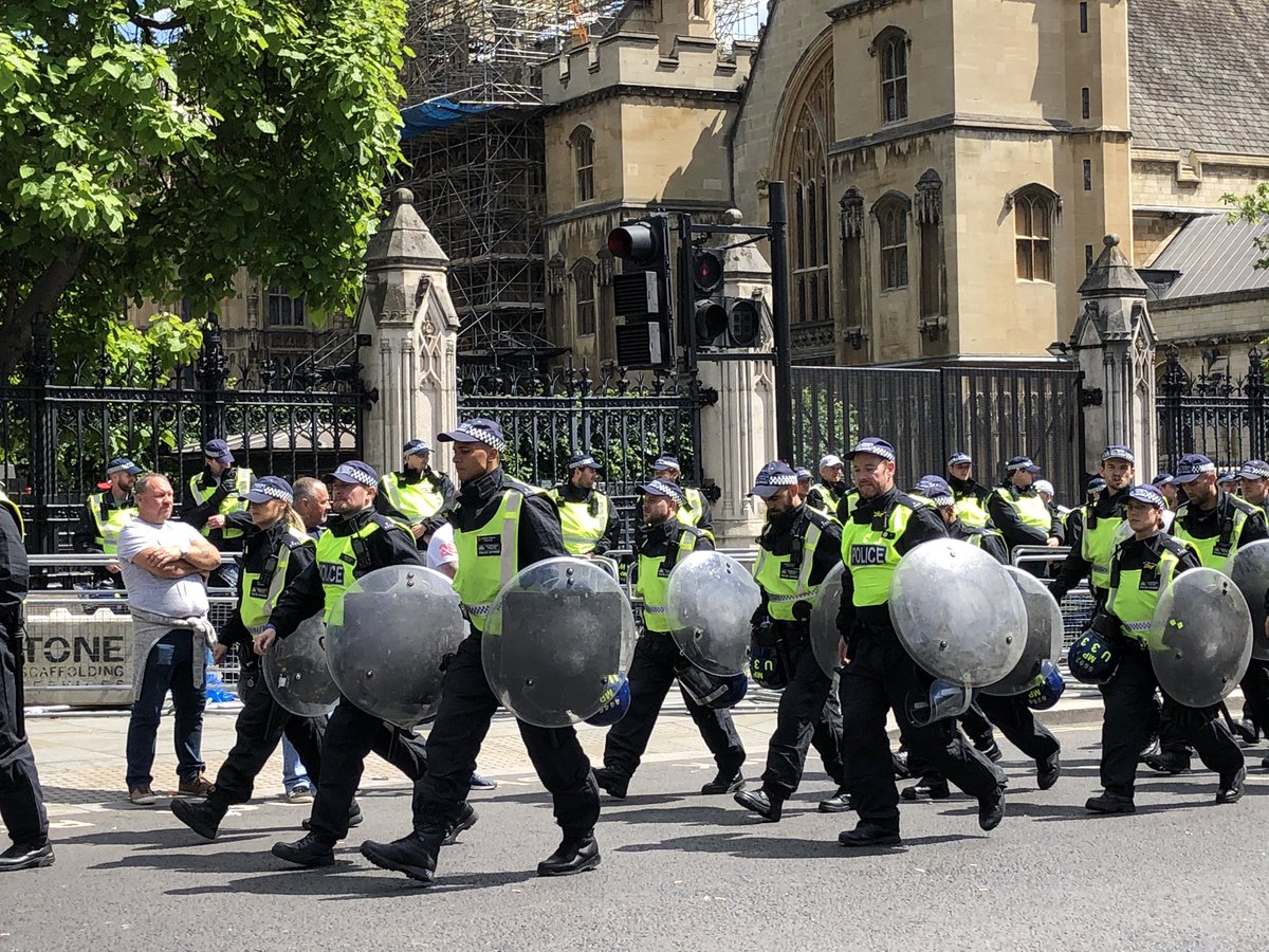 Riot police with shields marching past Parliament now. “You should’ve ...