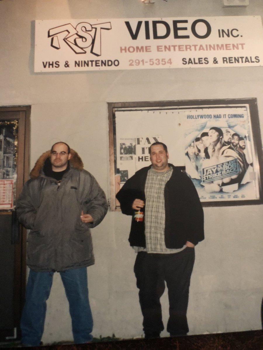 JoshPyro's tweet photo. Me and my buddy Aaron outside the #QuickStop and #RSTvideo in 2001. Note the #JayandSilentBobStrikeBack poster! @ThatKevinSmith @JayMewes https://t.co/ULxq1rcDOr