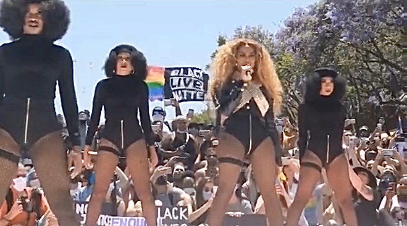 THegedty's tweet photo. the flags and the queen in one shot... 😩 ✊🏻✊🏽✊🏾✊🏿 #blm #pride https://t.co/DLyMBuEN9Q