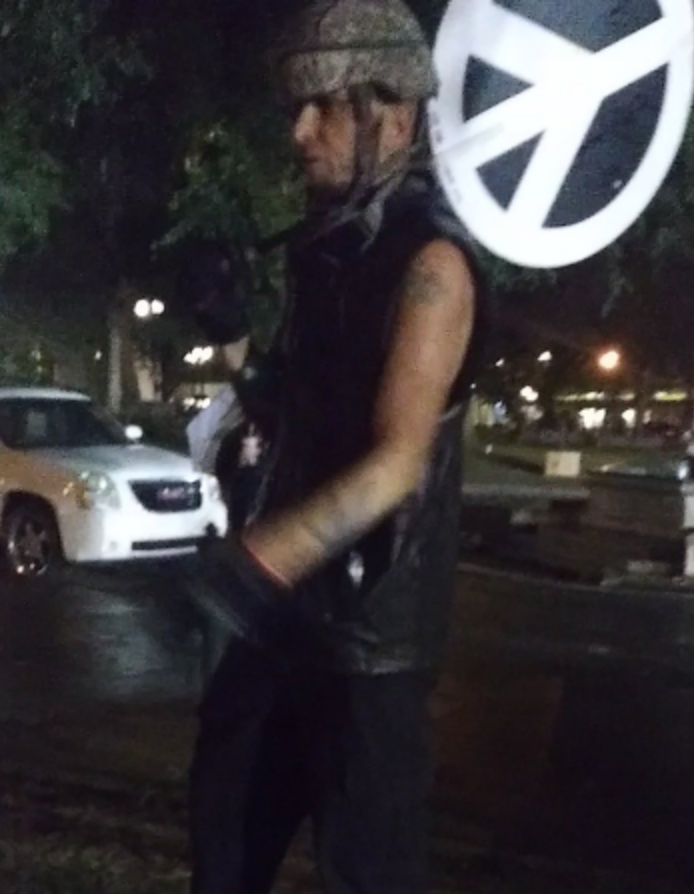11: Unknown agitator "Peace Sign/Army Helmet" - this person has been seen at several protests at the Fence, attacking femmes with his peace sign and rambling about "not being employed by George Soros." Last documented at Juneteenth I-5 bridge takeover (6/19/2020).