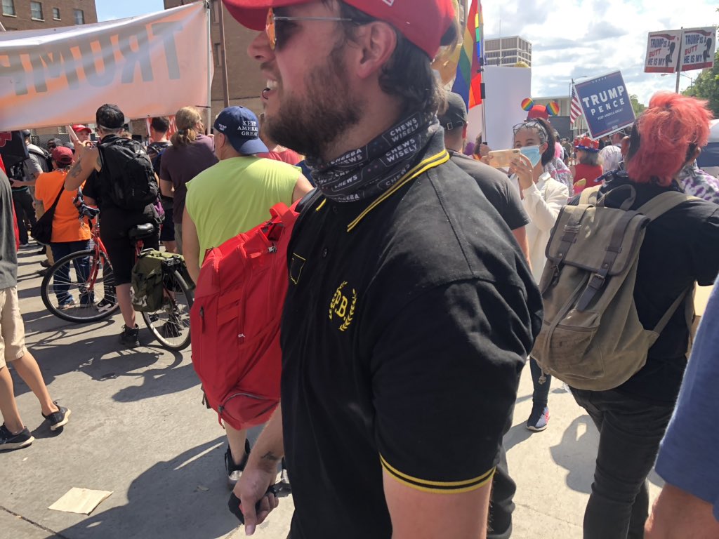 By the way, here on the civilian side of the police line, at least one Proud Boy.