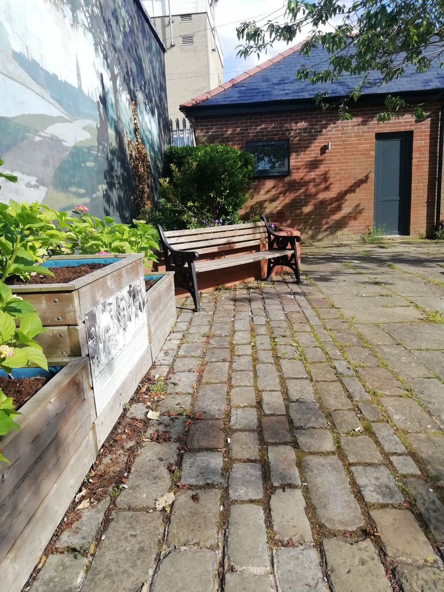 of it (the memorial benches) so you'll have to be in it now... I said slowly, "I hobbled over here with nothing on my foot and my shoe in my hand... What part of this do you think says, take my picture?!He actually took that pretty well. He asked me if I needed helpThis is it