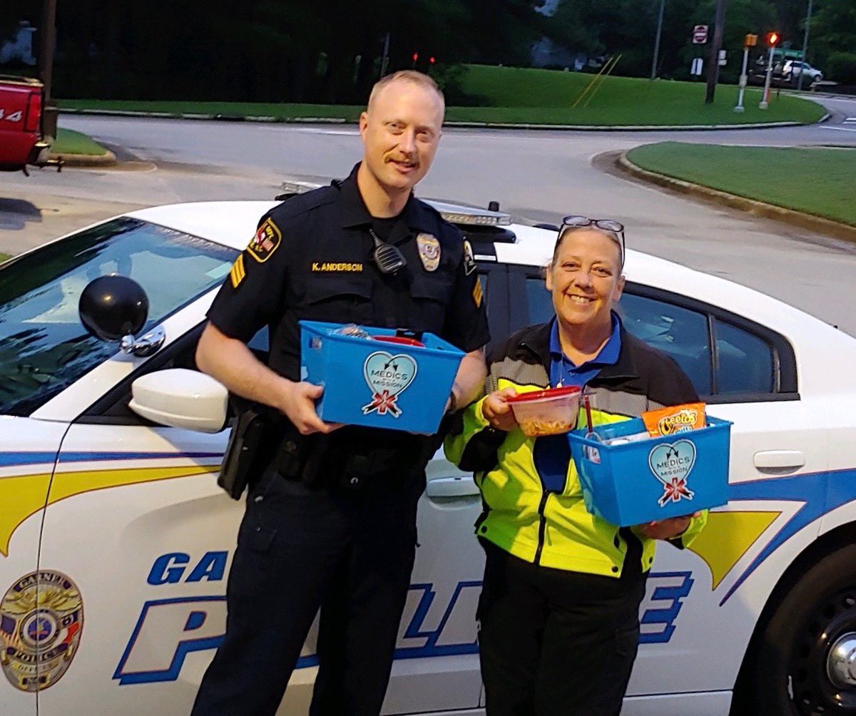 GarnerPolice's tweet photo. Congratulations to Sgt. Anderson and Officer Lee for being nominated and selected to receive a Bucket of Love from Medics with a Mission through @WakeCountyEMS. What a thoughtful and great program. https://t.co/C6zpgz6Ufz